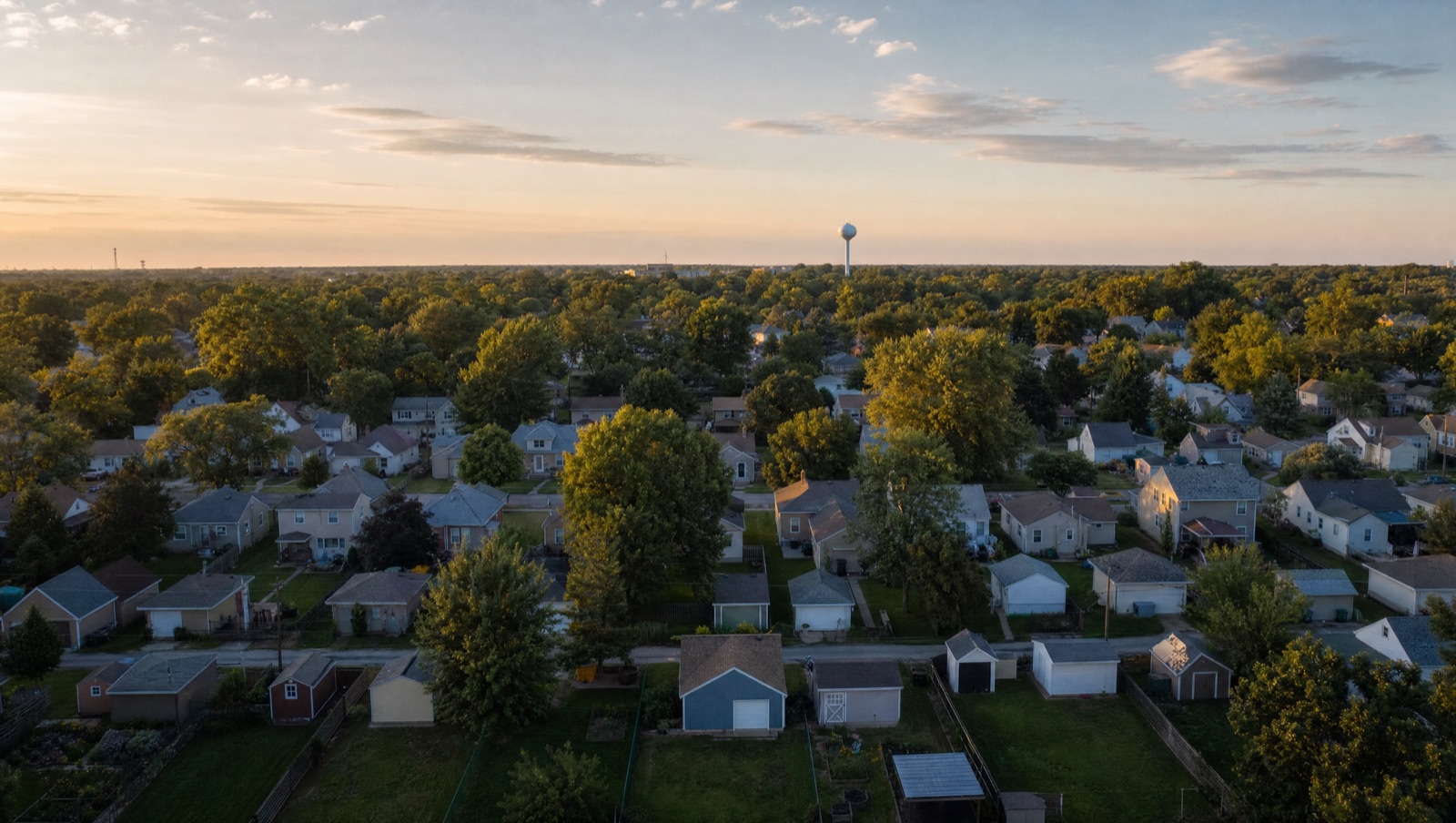 Aerial view of a Kansas City suburban street with a different shed in every backyard